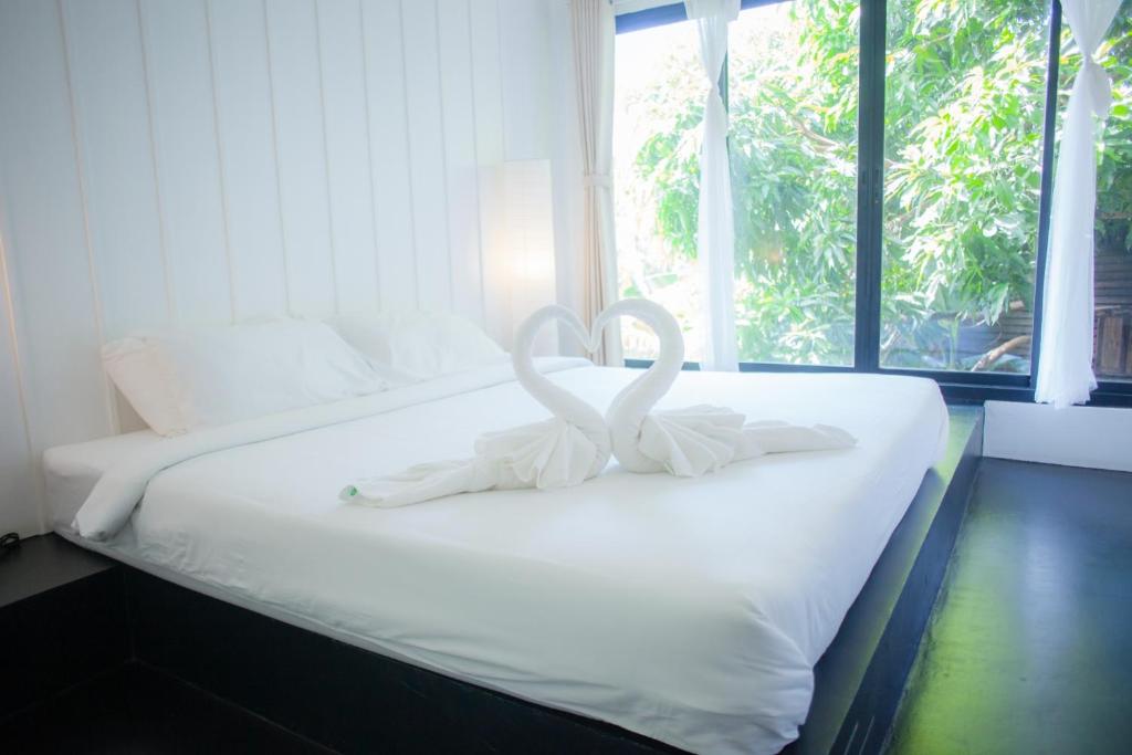 Postel nebo postele na pokoji v ubytování Trat 101 Hotel - SHA Certified