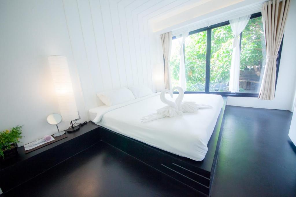 Postel nebo postele na pokoji v ubytování Trat 101 Hotel - SHA Certified
