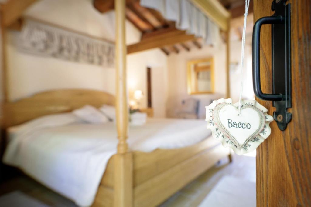 Postel nebo postele na pokoji v ubytování Agriturismo Selvella