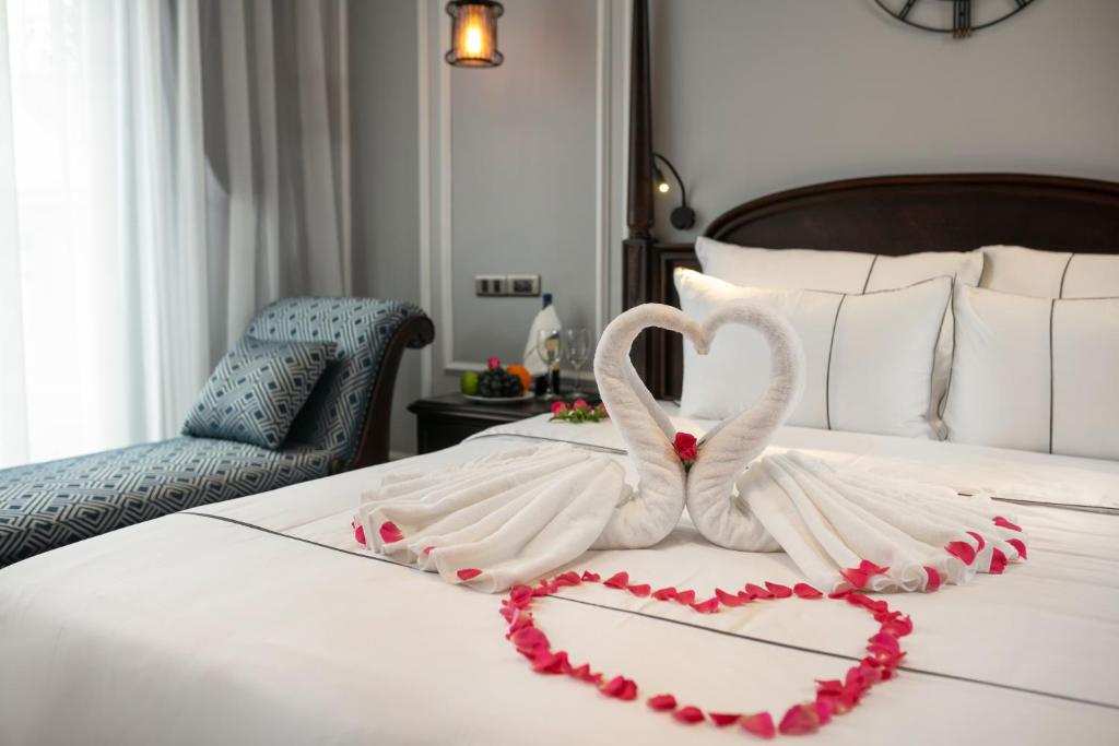 Postel nebo postele na pokoji v ubytování Canary Hotel