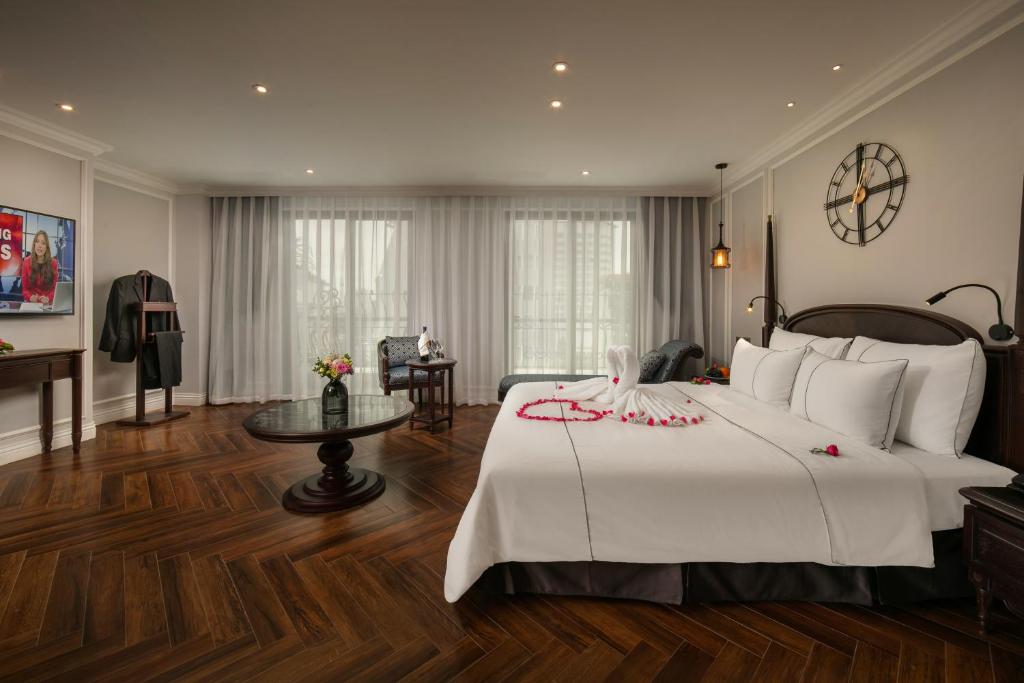 Postel nebo postele na pokoji v ubytování Canary Hotel