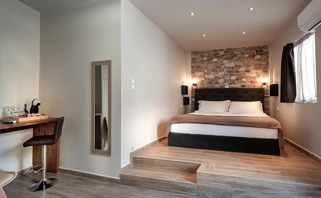 Postel nebo postele na pokoji v ubytování Pallada Athens boutique rooms & apartments