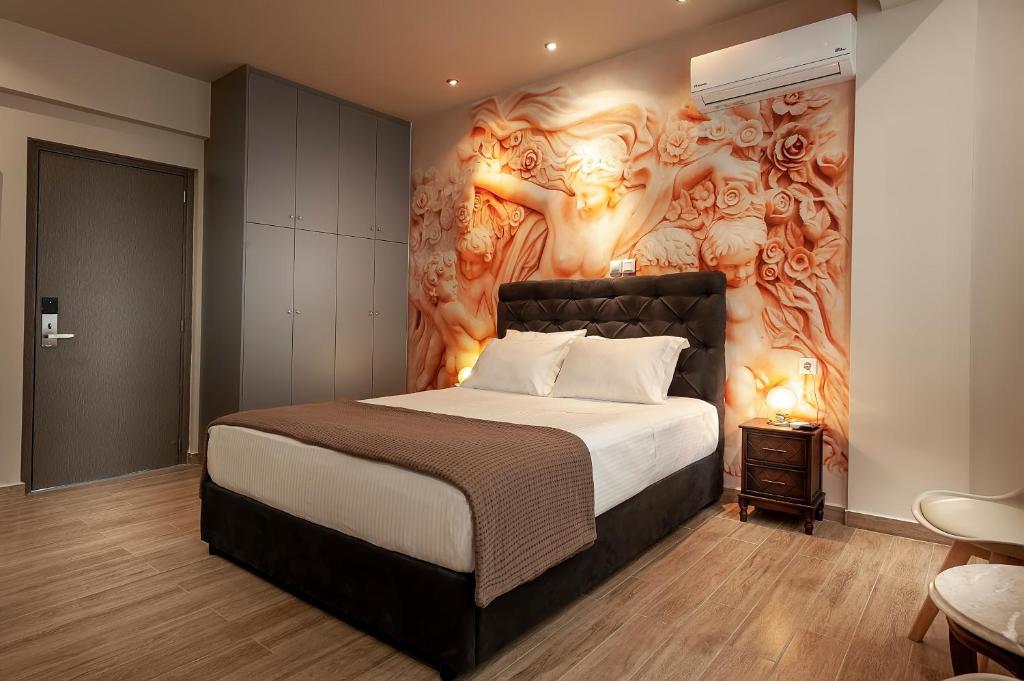 Postel nebo postele na pokoji v ubytování Pallada Athens boutique rooms & apartments
