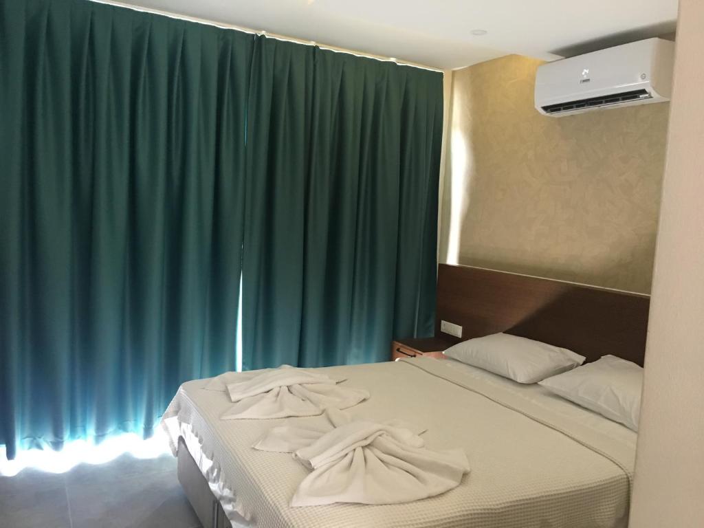 Postel nebo postele na pokoji v ubytování On Oda Oludeniz