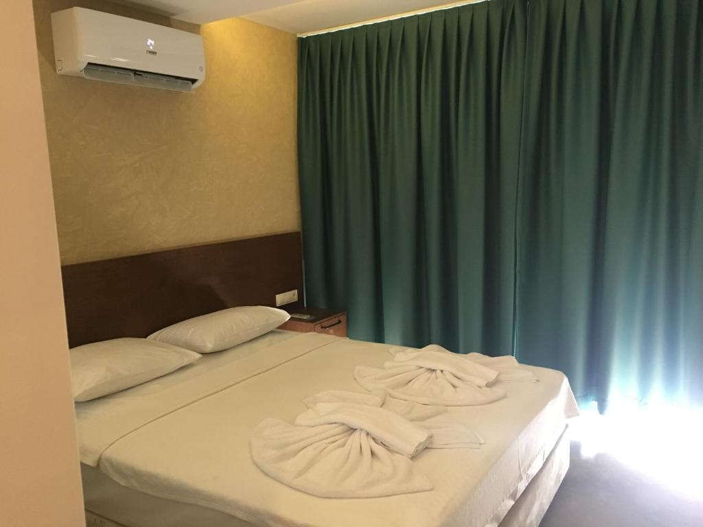 Postel nebo postele na pokoji v ubytování On Oda Oludeniz