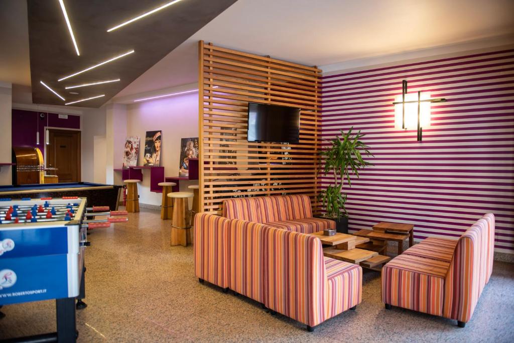 TV a/nebo společenská místnost v ubytování HOTEL - BAR DA NATALE