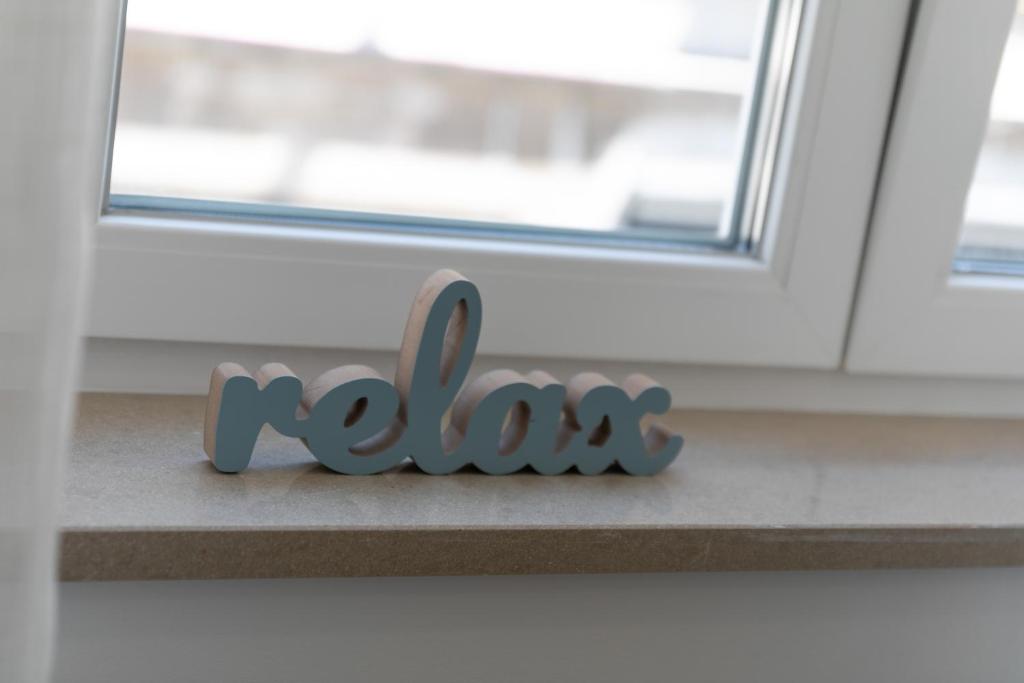 Certifikat, nagrada, logo ili neki drugi dokument izložen u objektu La Preziosa Rooms