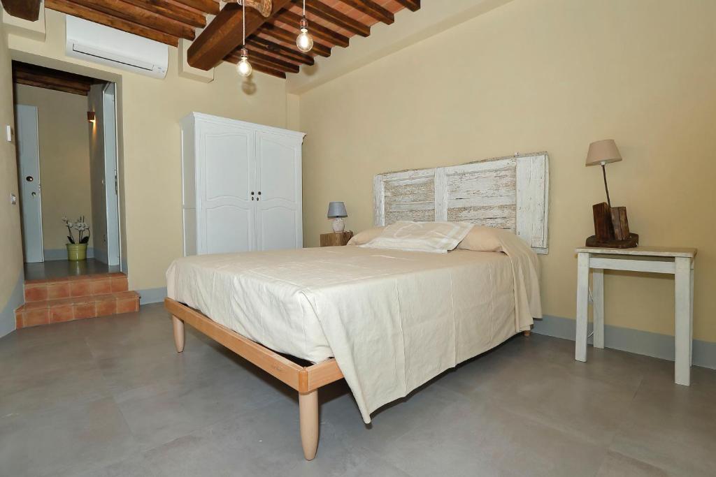 Postel nebo postele na pokoji v ubytování B&B CASAGRANDE