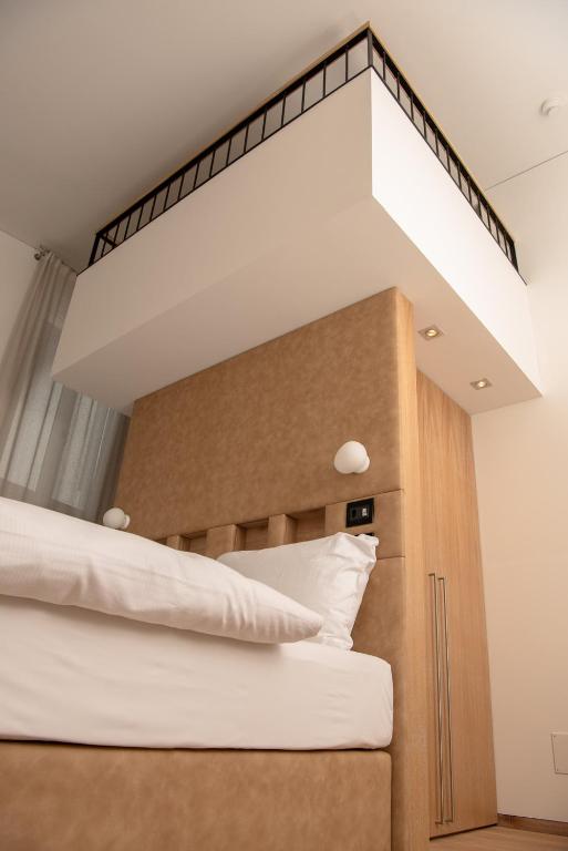Vuode tai vuoteita majoituspaikassa Hotel Gabbani