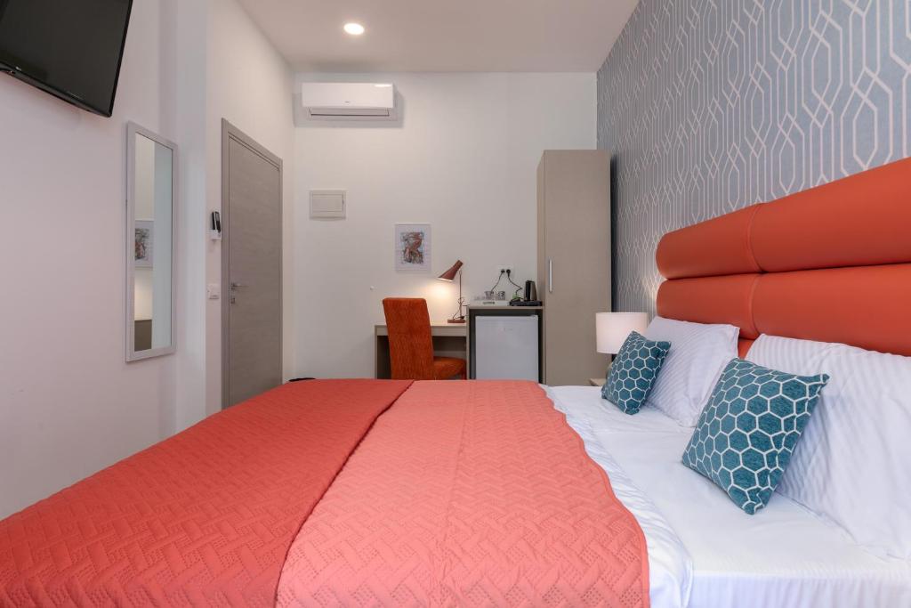 Krevet ili kreveti u jedinici u objektu La Preziosa Rooms