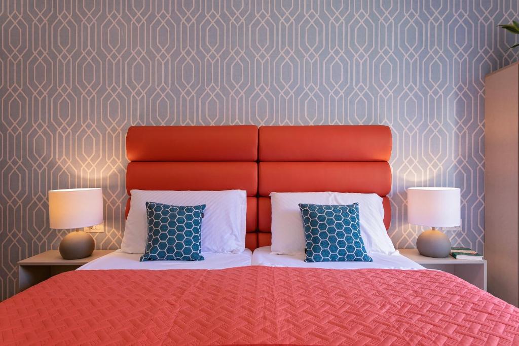 Krevet ili kreveti u jedinici u objektu La Preziosa Rooms