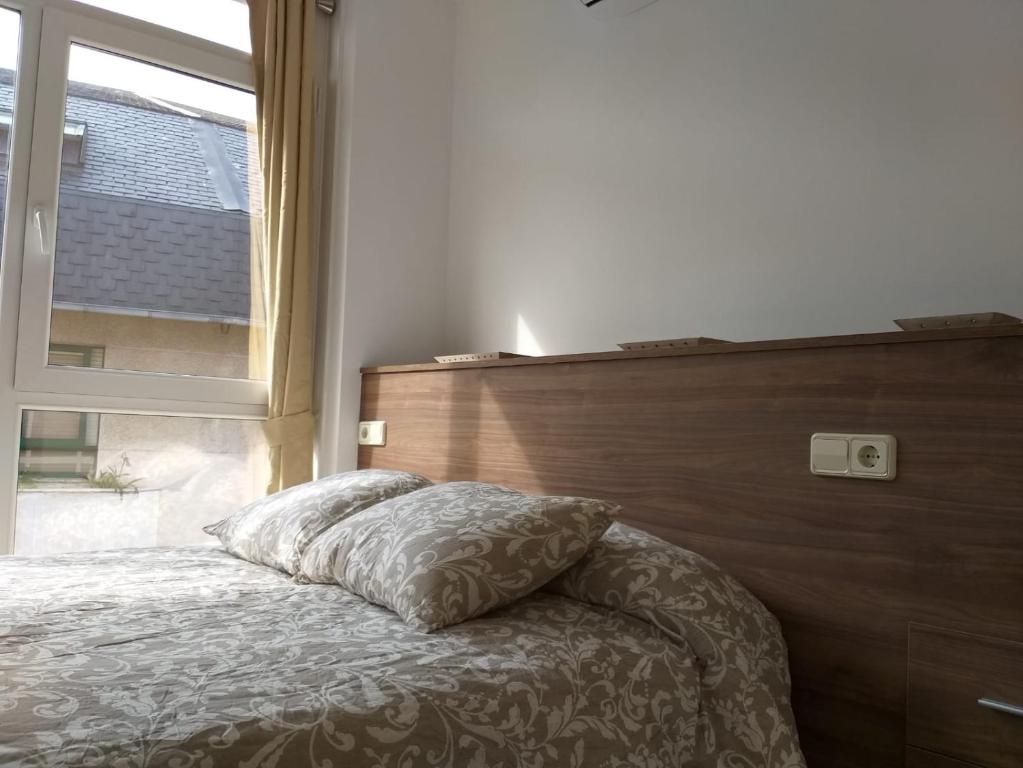 Posteľ alebo postele v izbe v ubytovaní Apartamento en Ribeira(centro) 4* planta