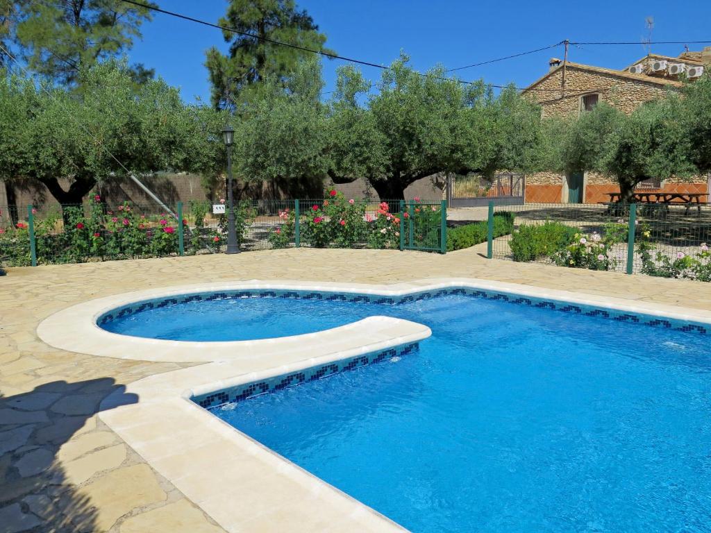 Swimmingpoolen hos eller tæt på Casa El Ros II - Turistrat