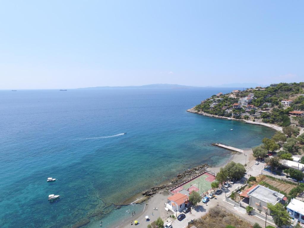 an aerial view of the beach and ocean at Euripidean View, Apartments in Salamina