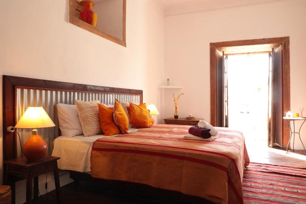 Postel nebo postele na pokoji v ubytování Casa Colonial Koenig