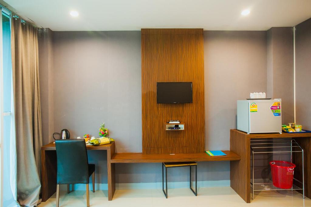 TV a/nebo společenská místnost v ubytování Km Hotel Chiang Mai