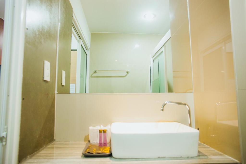 Koupelna v ubytování Km Hotel Chiang Mai