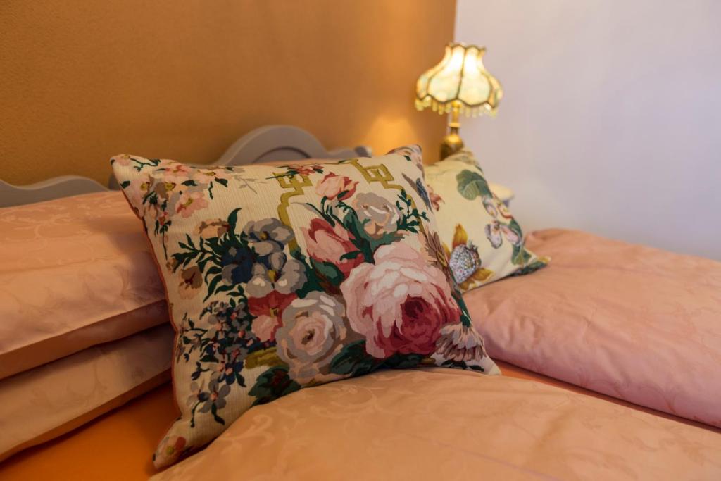 Postel nebo postele na pokoji v ubytování Zenana Boutique Hotel