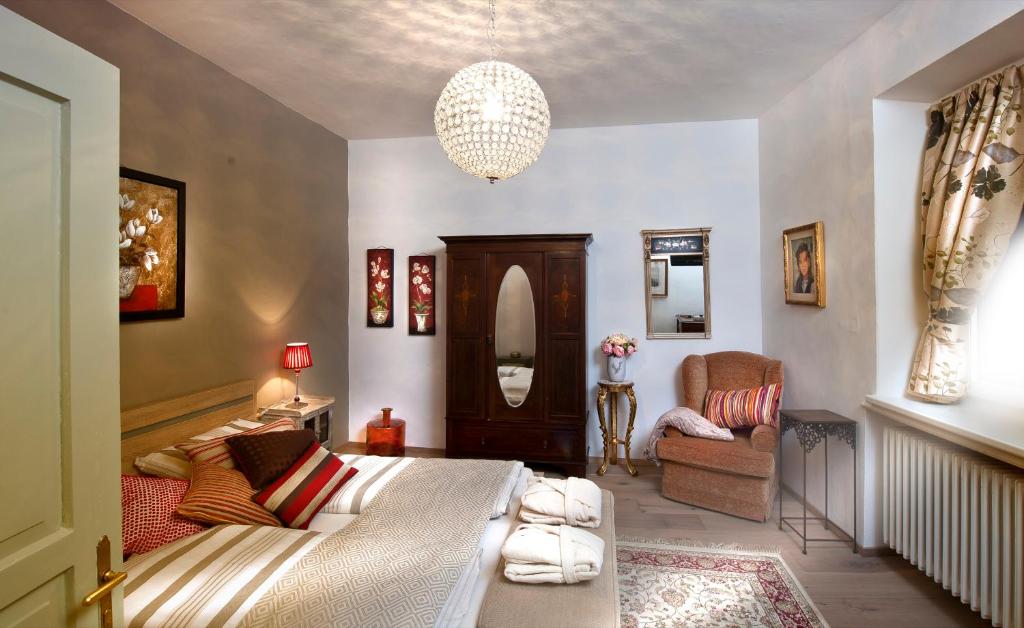 Postel nebo postele na pokoji v ubytování Zenana Boutique Hotel