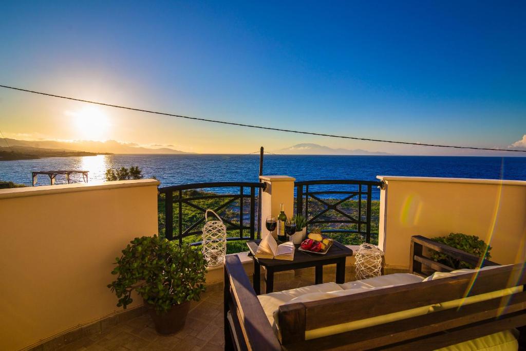 a balcony with a view of the ocean at Kondarini Villa - Stunning Sea Views, 290m from the beach, by ZanteWize in Tsilivi