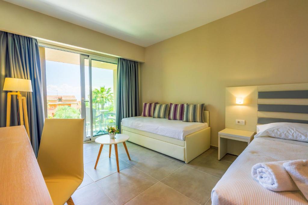 Postel nebo postele na pokoji v ubytování CNic Gemini Hotel
