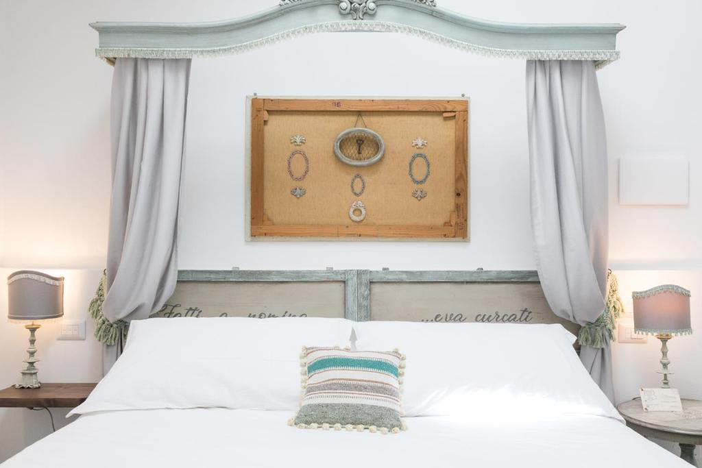Ένα ή περισσότερα κρεβάτια σε δωμάτιο στο Addimora Boutique Suites