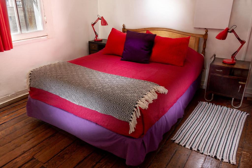 Postel nebo postele na pokoji v ubytování Casa Volante Hostal