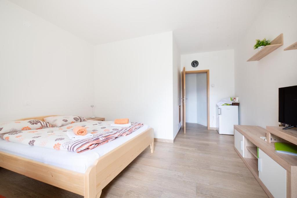 Postel nebo postele na pokoji v ubytování House DorMica