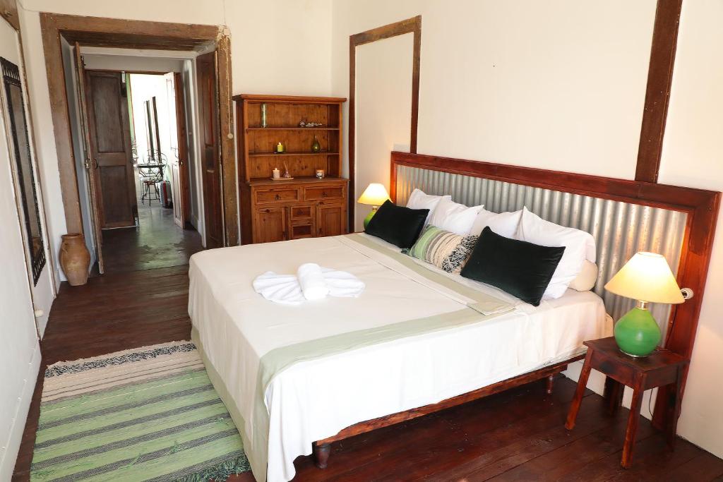 Postel nebo postele na pokoji v ubytování Casa Colonial Koenig