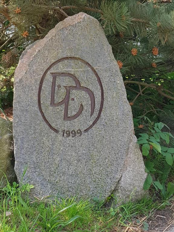 a rock with the letter f on it at Reitanlage Duffner in Horst