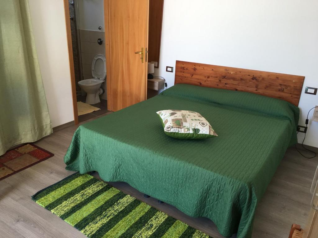 Postel nebo postele na pokoji v ubytování Camere Con Terrazzino