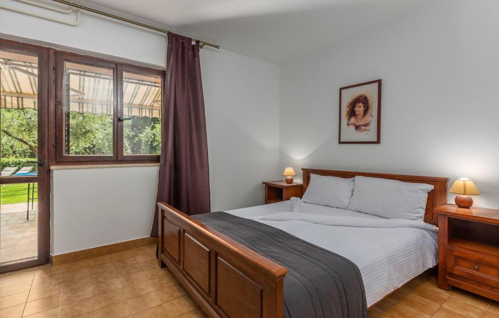 Postel nebo postele na pokoji v ubytování Apartments Rakovac