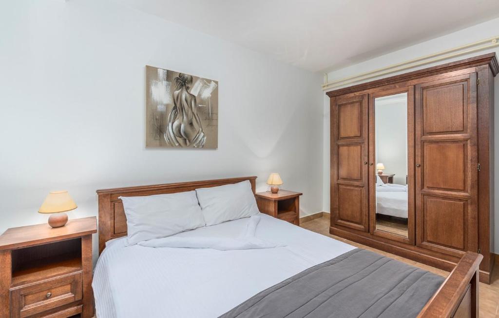 Postel nebo postele na pokoji v ubytování Apartments Rakovac