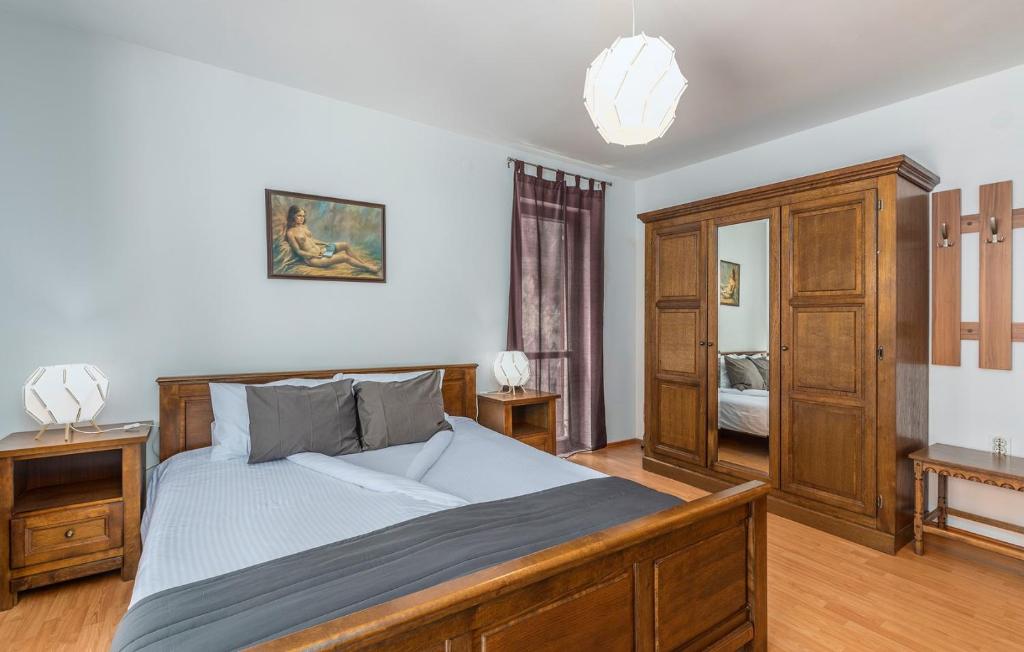 Postel nebo postele na pokoji v ubytování Apartments Rakovac