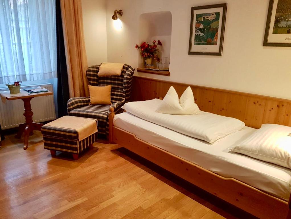 Postel nebo postele na pokoji v ubytování Hotel Schrannenhof