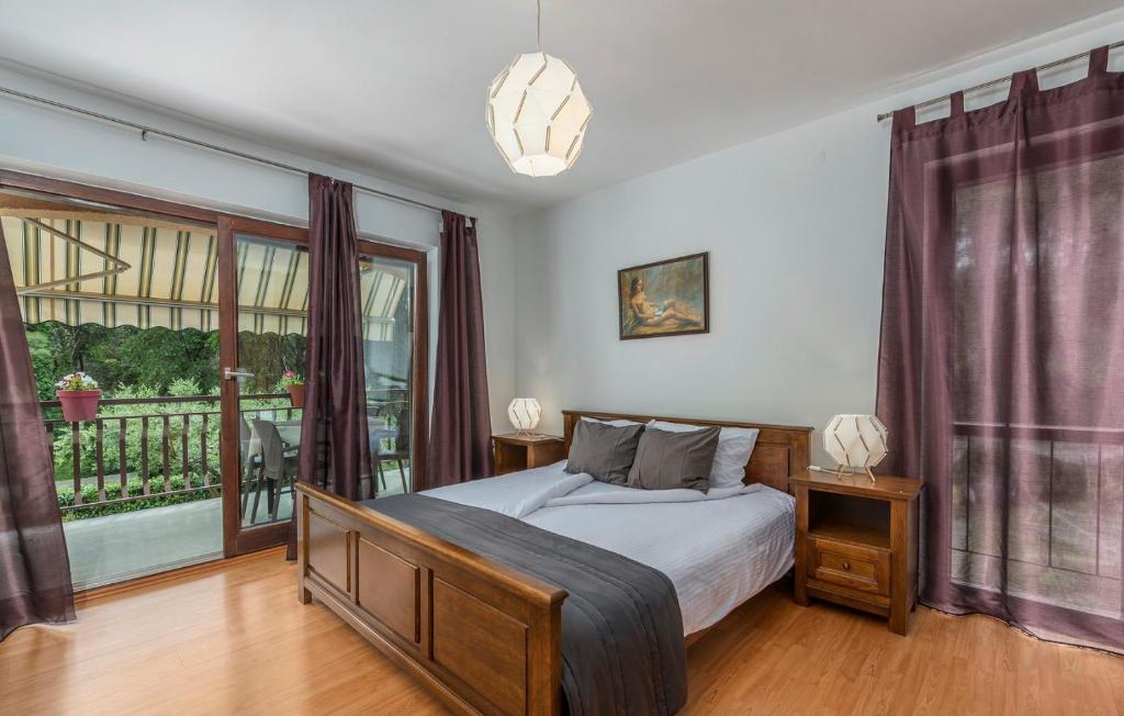 Postel nebo postele na pokoji v ubytování Apartments Rakovac
