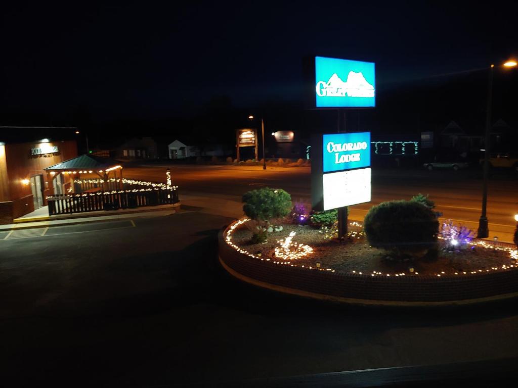 a sign in the middle of a street at night at Great Western Colorado Lodge in Salida