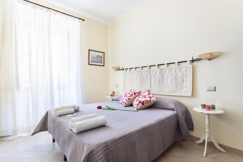 Postel nebo postele na pokoji v ubytování B&B Villamarì