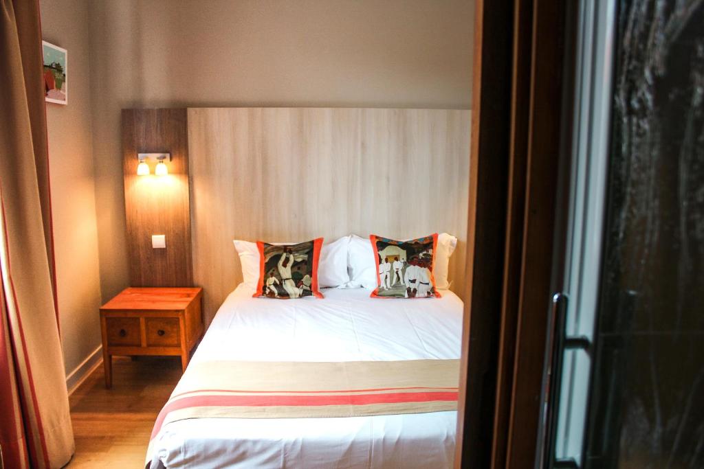 Postel nebo postele na pokoji v ubytování Hotel Agur Deneri