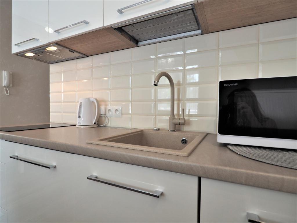 Kuchyňa alebo kuchynka v ubytovaní VIP Apartamenty Cristal