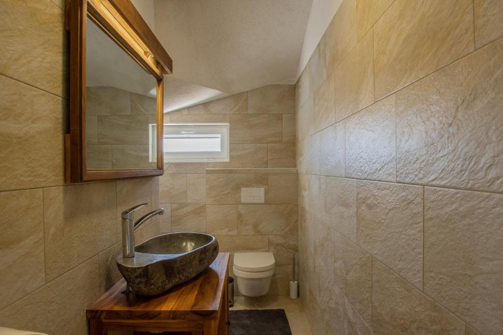 Kúpeľňa v ubytovaní VILLA Temida Premuda
