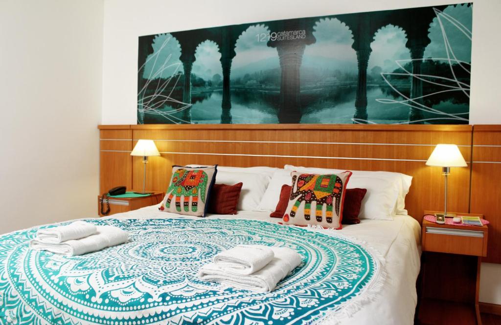 Postel nebo postele na pokoji v ubytování Catamarca Suites Land