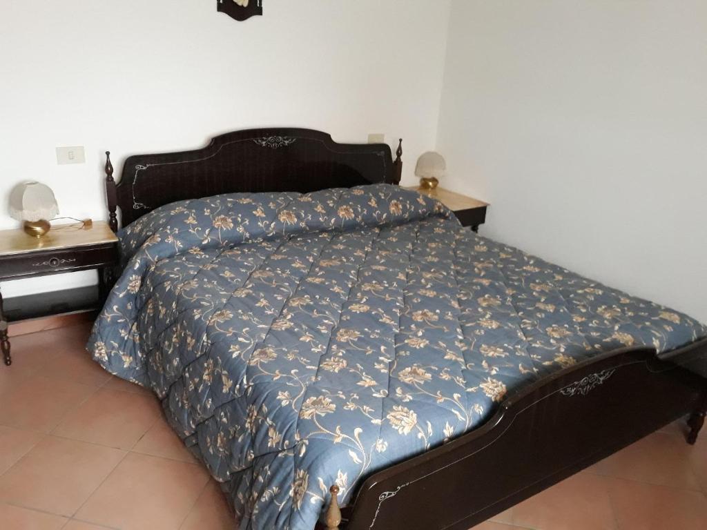 Ένα ή περισσότερα κρεβάτια σε δωμάτιο στο B&B L'uva Fragolina