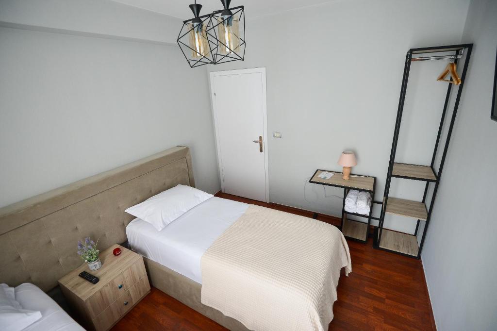 Postel nebo postele na pokoji v ubytování Hotel Niku
