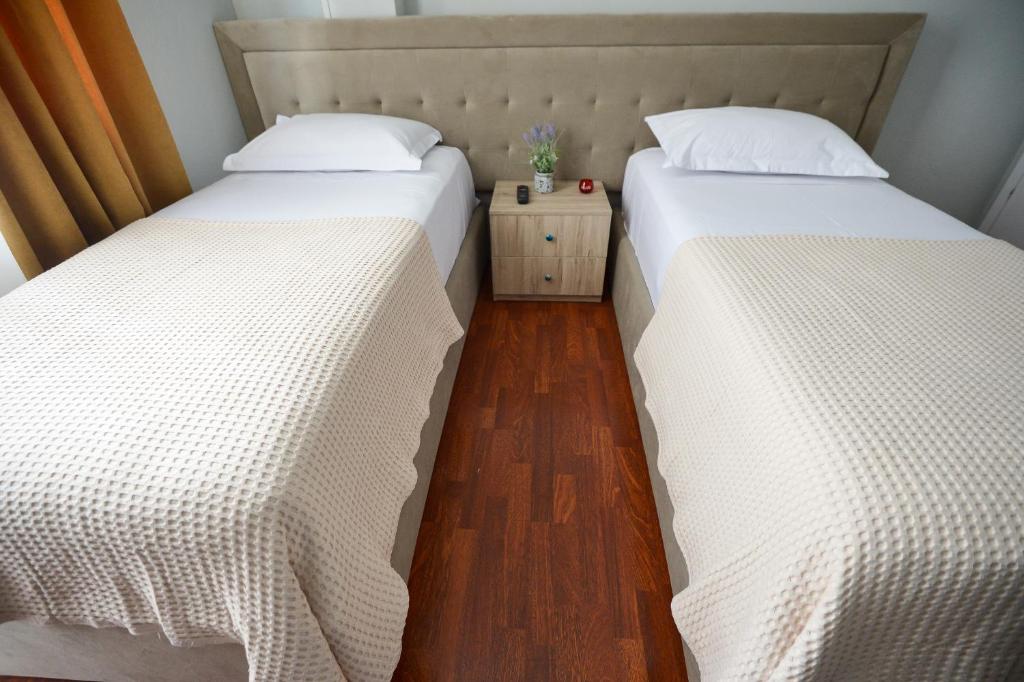 Postel nebo postele na pokoji v ubytování Hotel Niku
