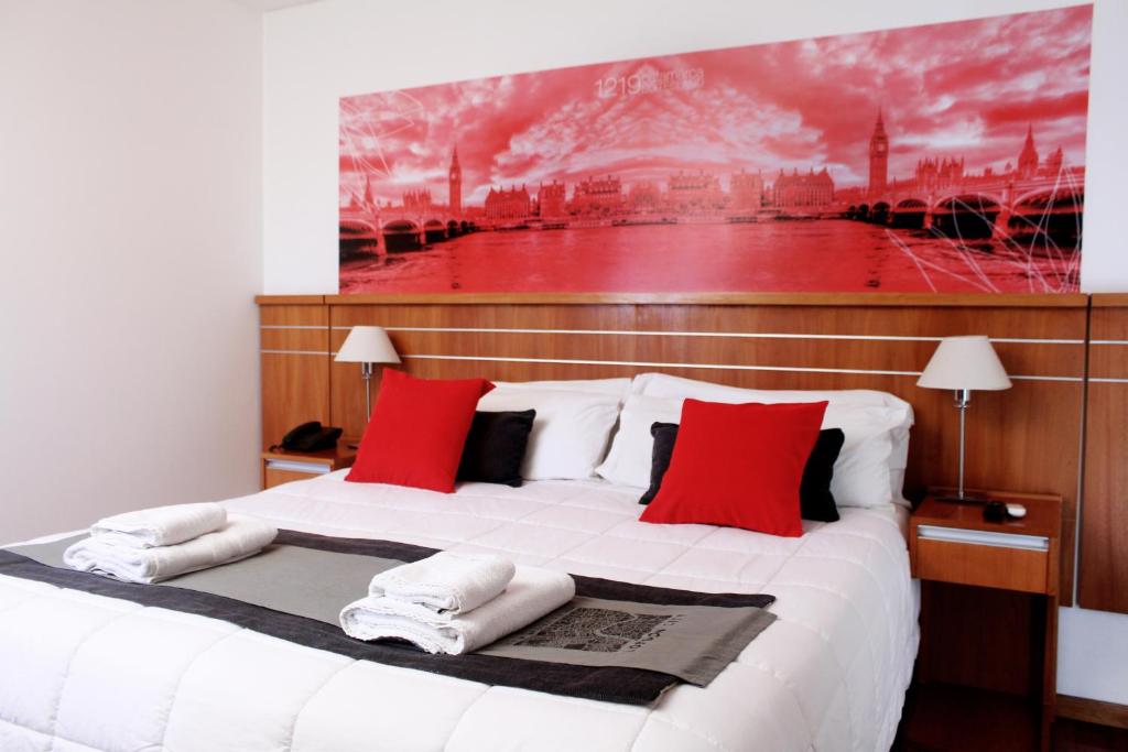 Postel nebo postele na pokoji v ubytování Catamarca Suites Land