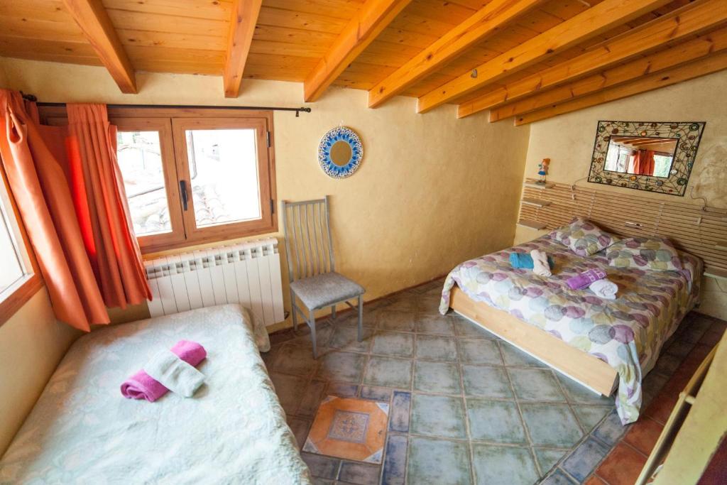 A bed or beds in a room at La Fuente de Arnedillo