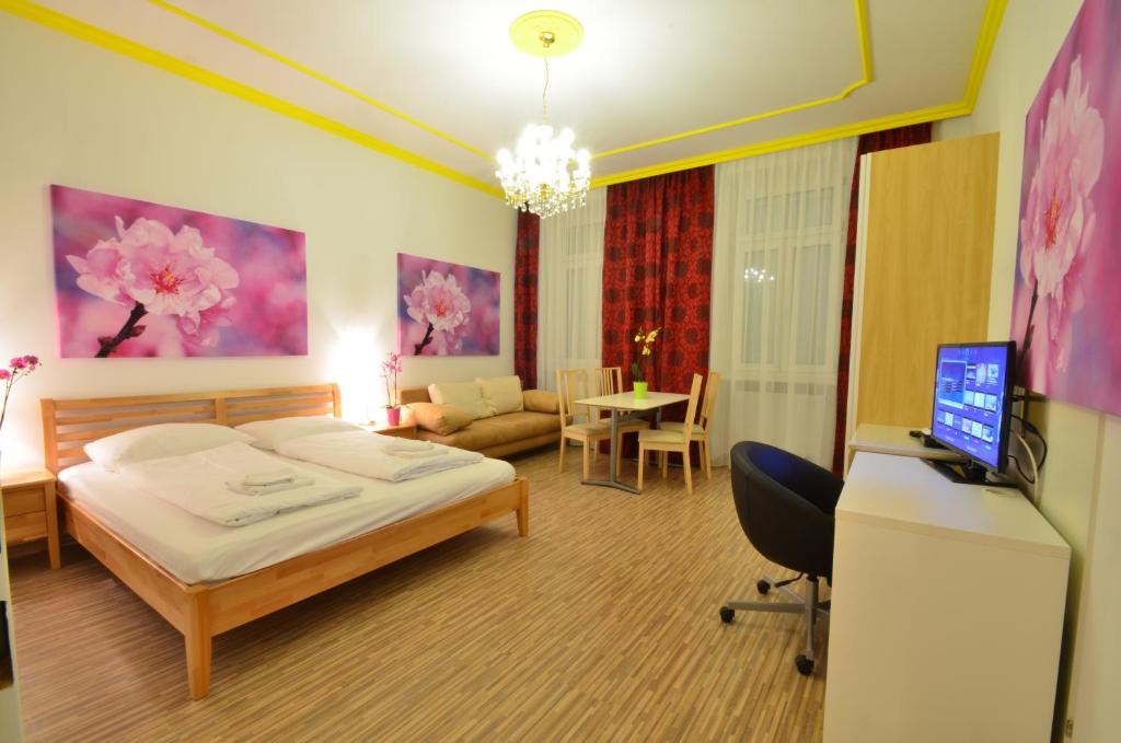 TV o dispositivi per l'intrattenimento presso AJO Apartments - Messe City Flat - Self-Check-in