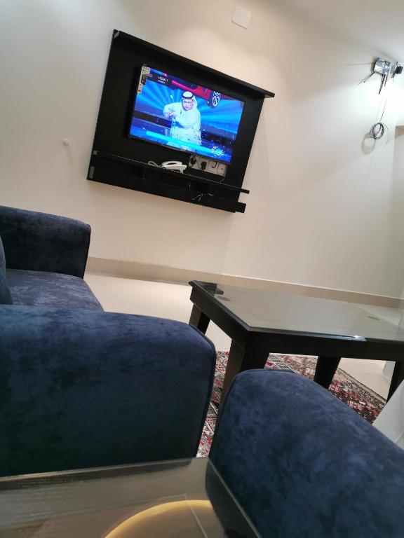 TV a/nebo společenská místnost v ubytování Alwan apartment hotel