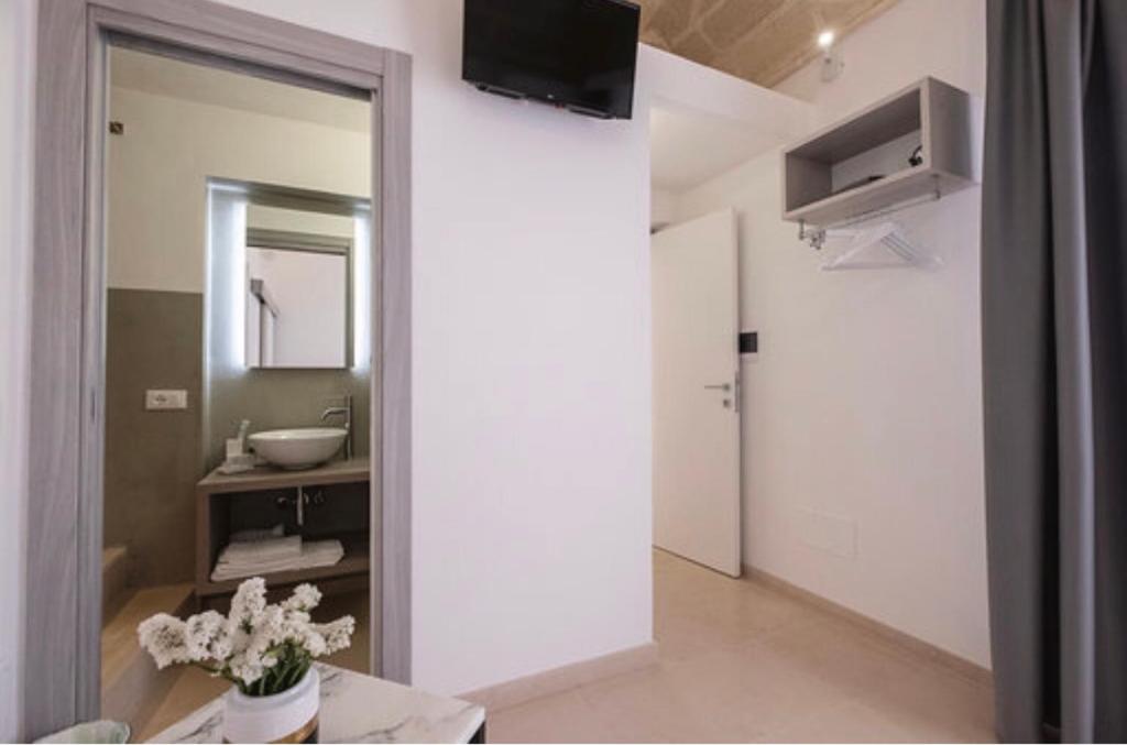 TV a/nebo společenská místnost v ubytování Imera B&B